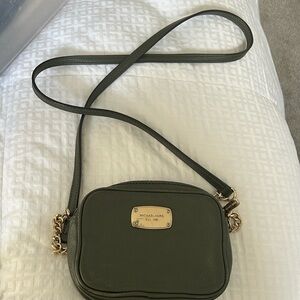 Michael Kors green and gold clutch